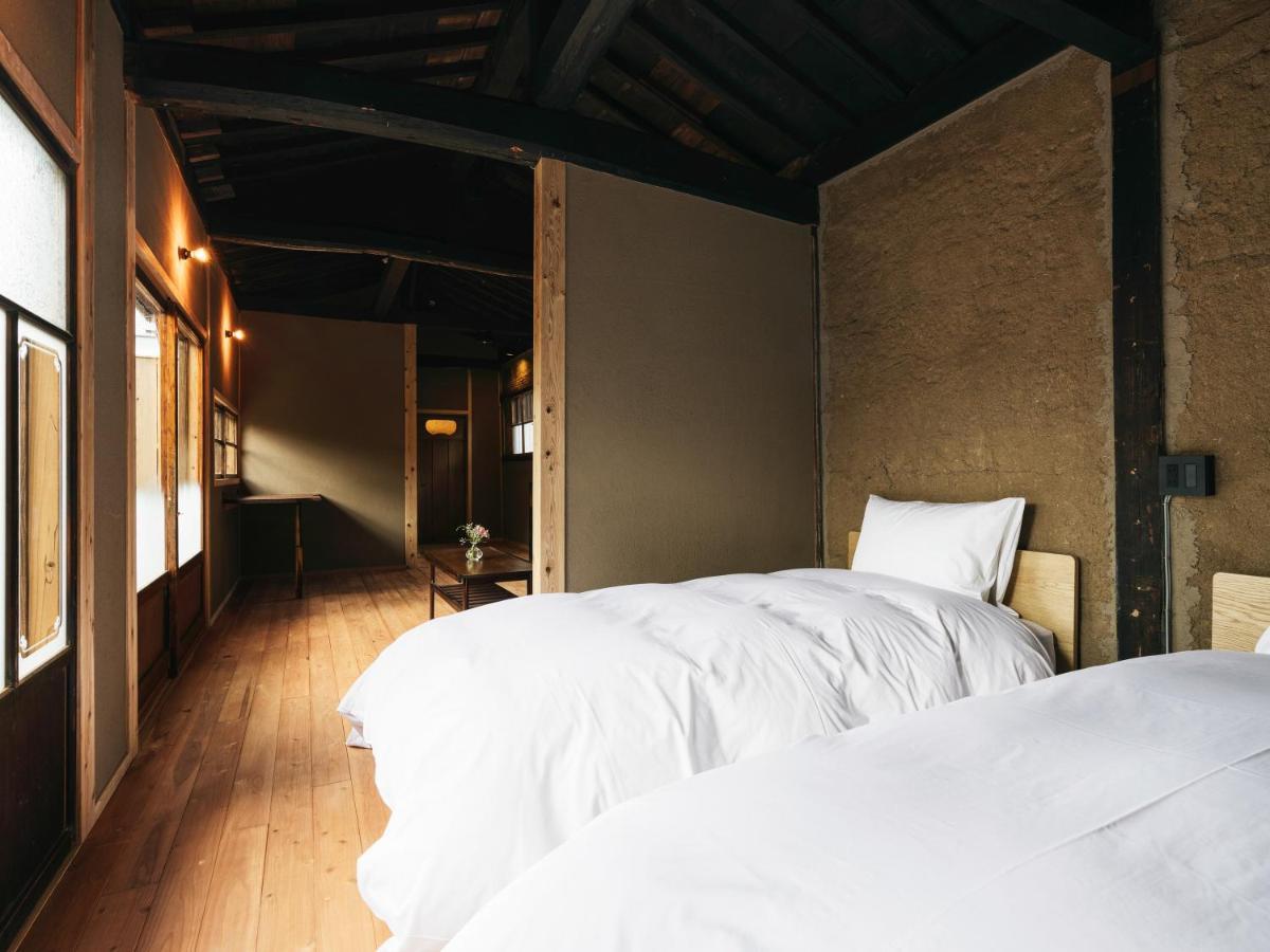 Minamo Hotel Ukiha Bagian luar foto